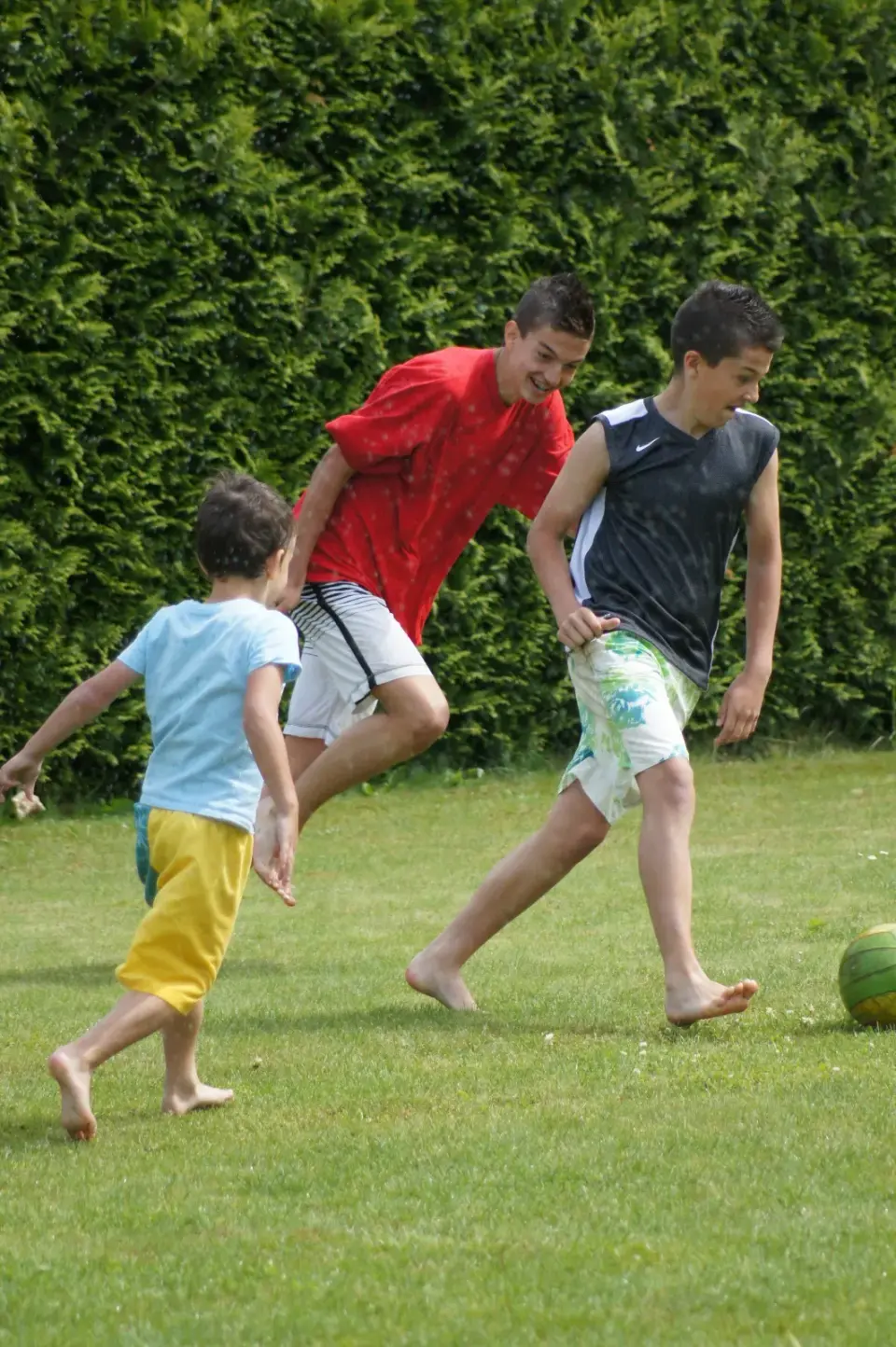 Football players competing for the ball.